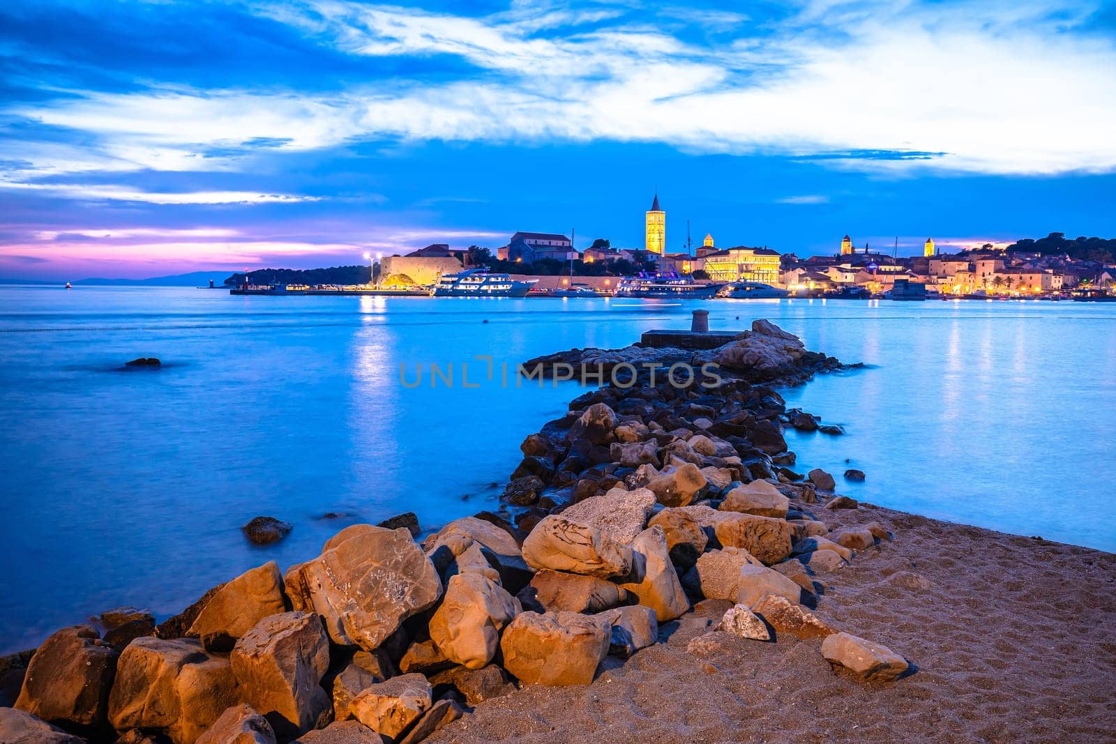 Historic town of Rab beach and architecture evening view, Island of Rab, Adriatic archipelago of Croatia