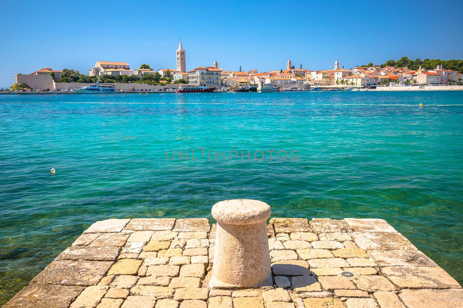 Historic town of Rab scenic beach and architecture view, Island of Rab by xbrchx