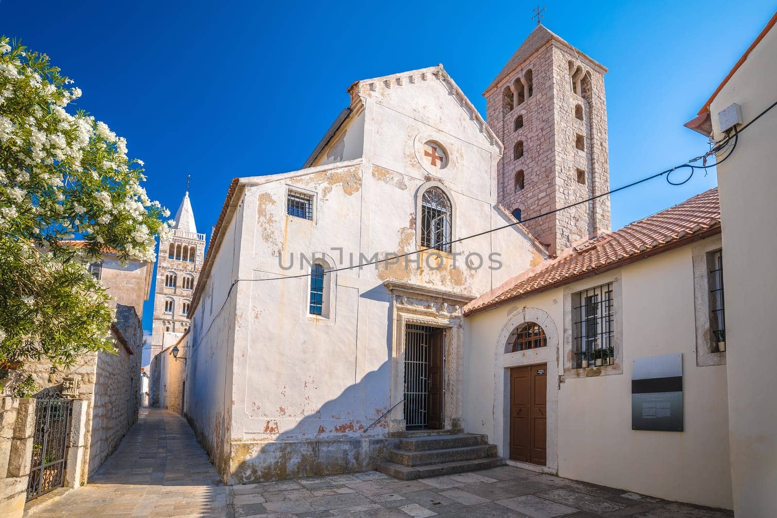 Town of Rab scenic stone street and church towers view, island of Rab, archipelago of Croatia