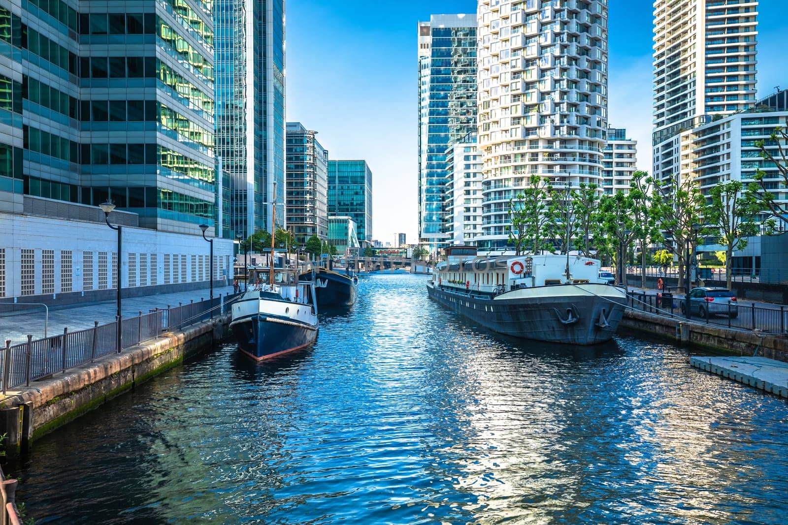 Canary Wharf financial district of London skyscrapers and canal view by xbrchx