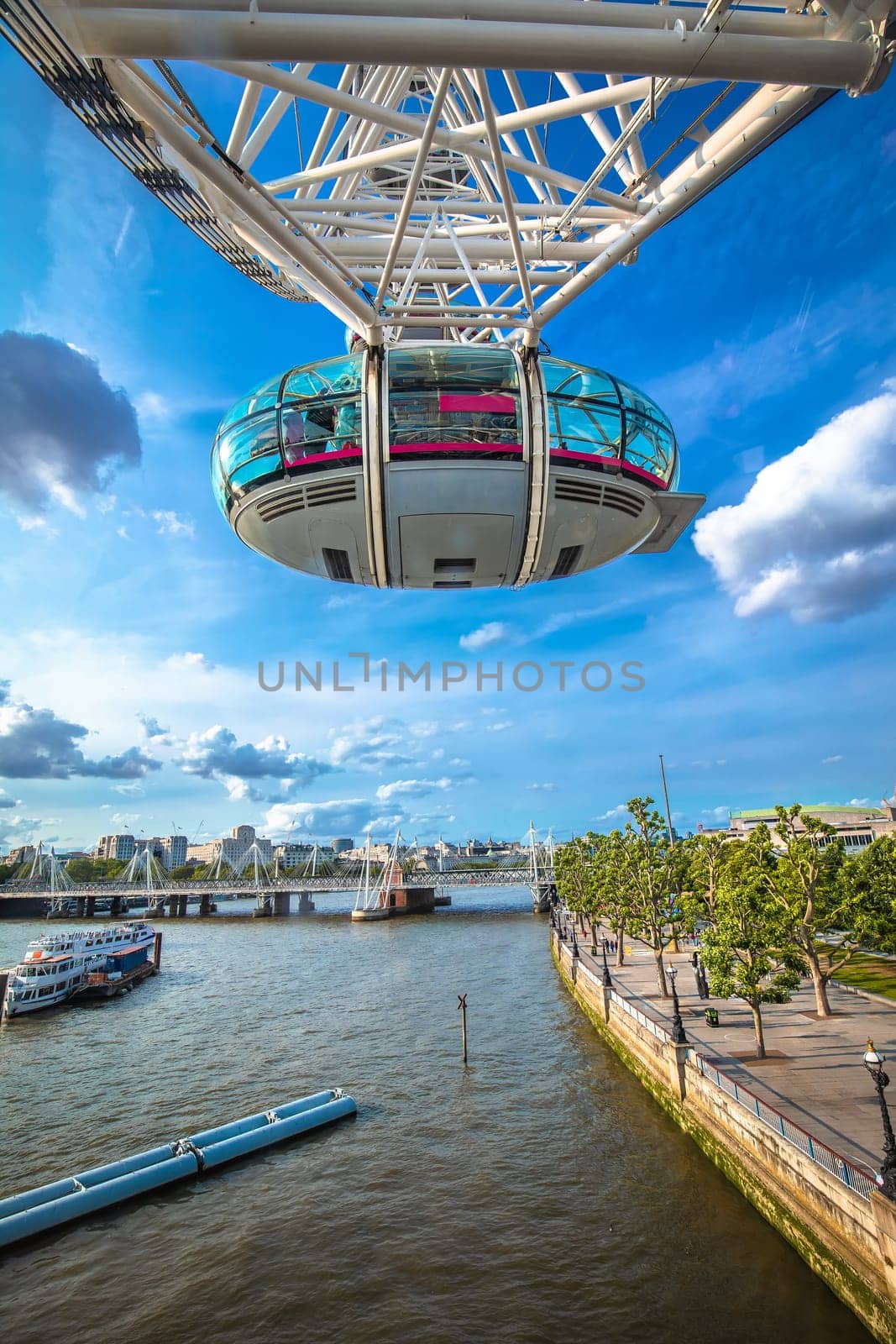 Scenic giant ferris wheel on Thames river in London view, capital of United Kingdom