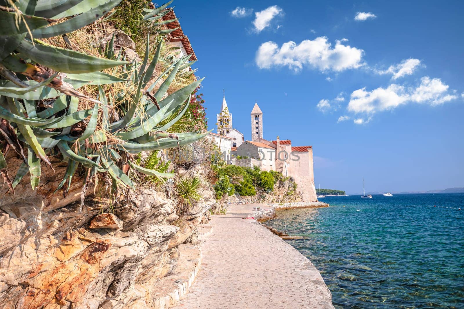 Historic town of Rab towers and beach walkway view, archipelago of Croatia, Dalmatia