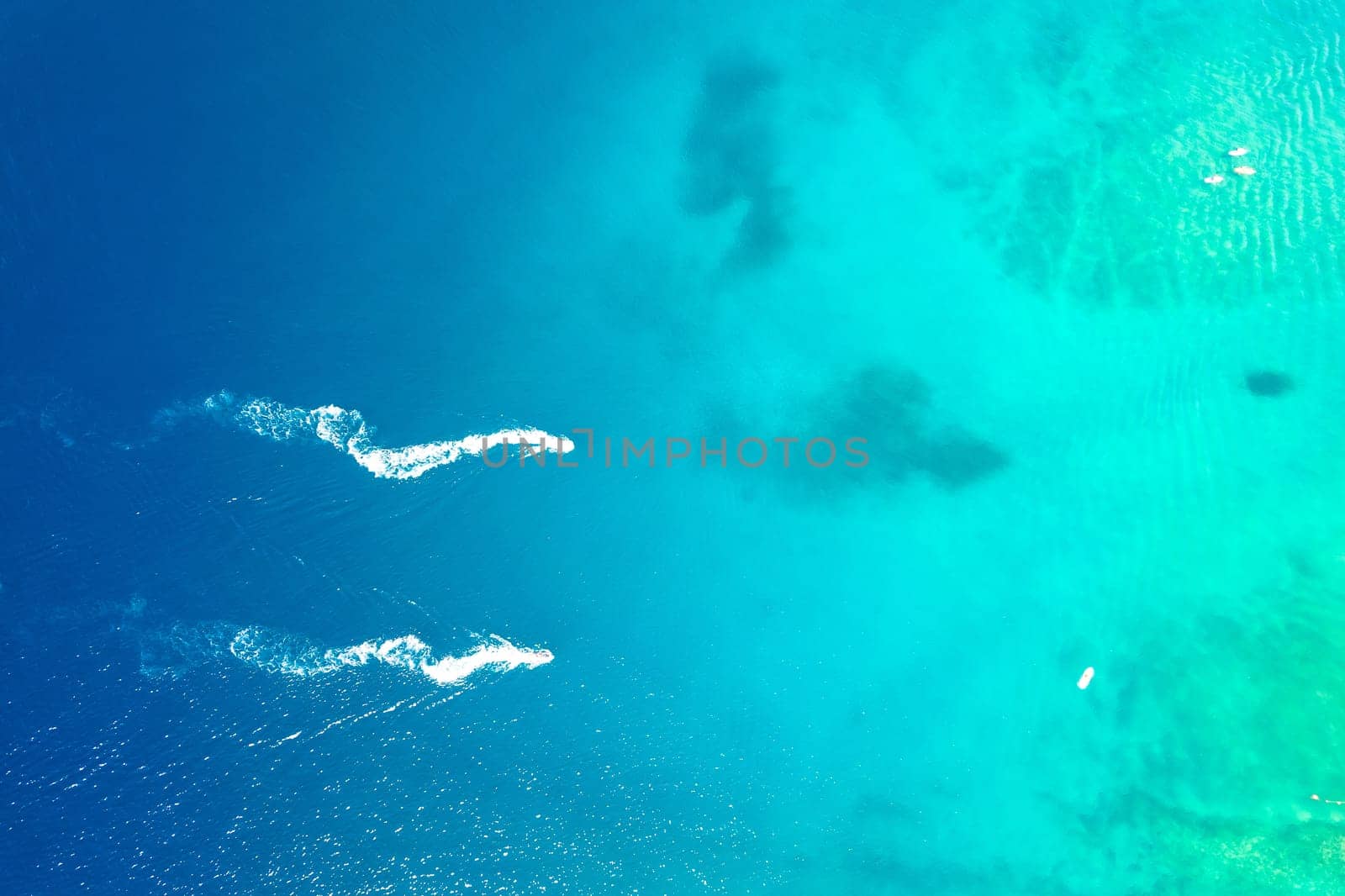 Jet Ski on turquoise sea aerial view, summer fun on coast of Croatia