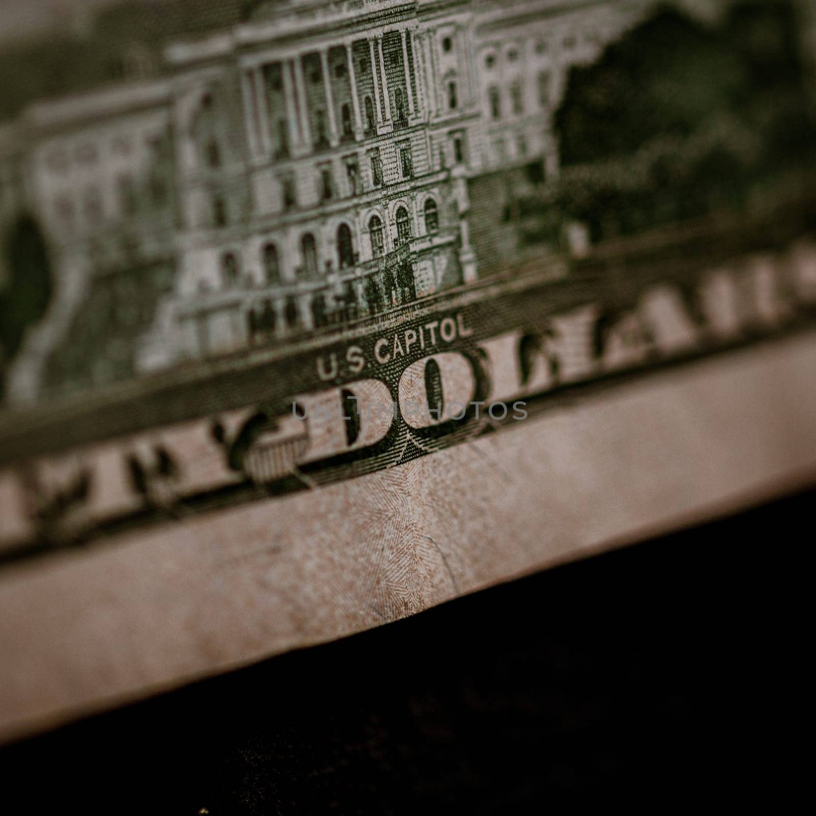 Macro shot of USD currency. USD inflation, US money by vladispas