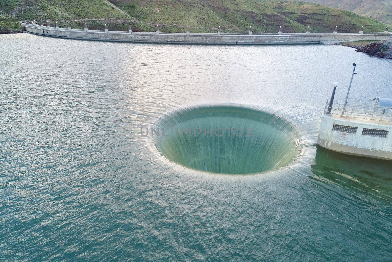 spillway near a dam to prevent overflowing water