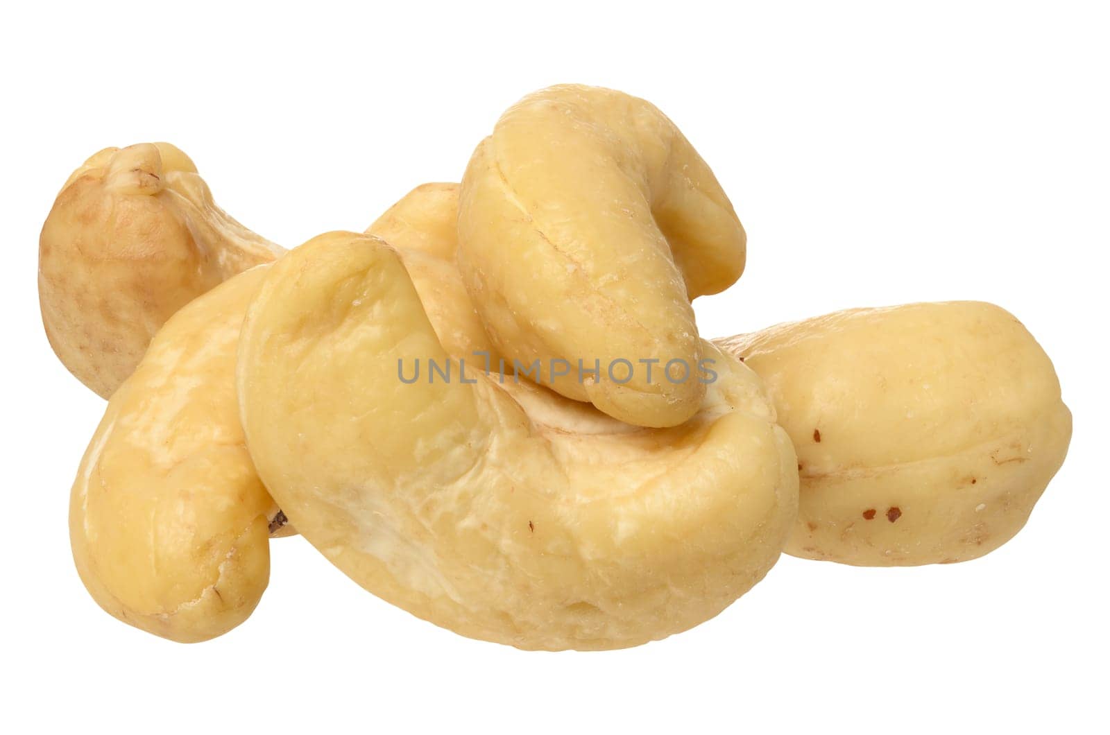 Heap of peeled cashew nuts on isolated background by ndanko