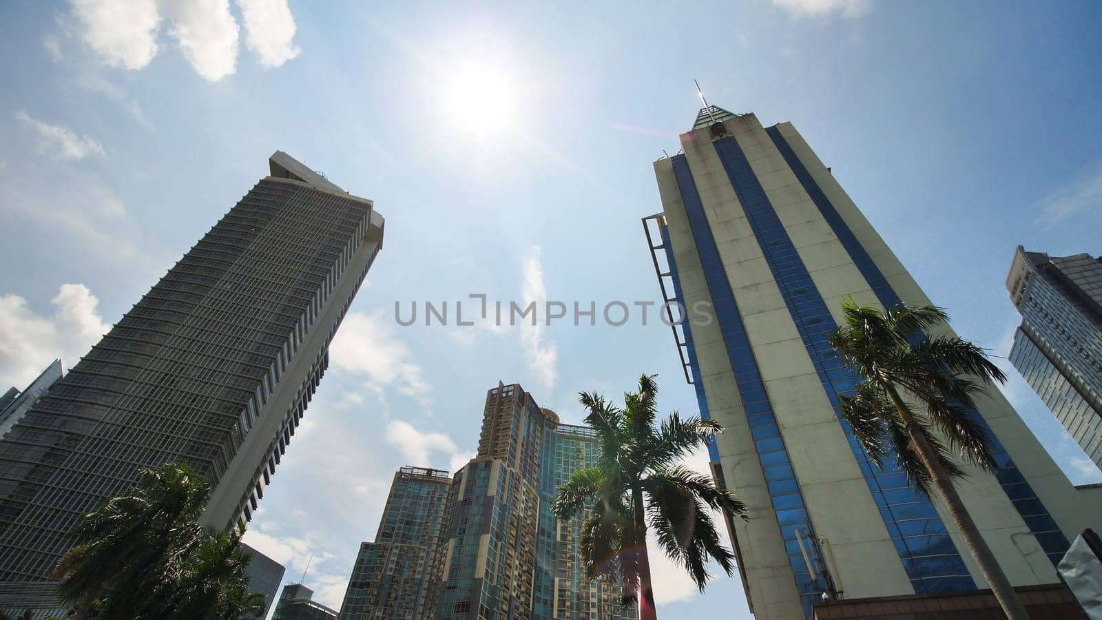 Skyscrapers of Jakarta, the capital of Indonesia, on a sunny day. by DovidPro