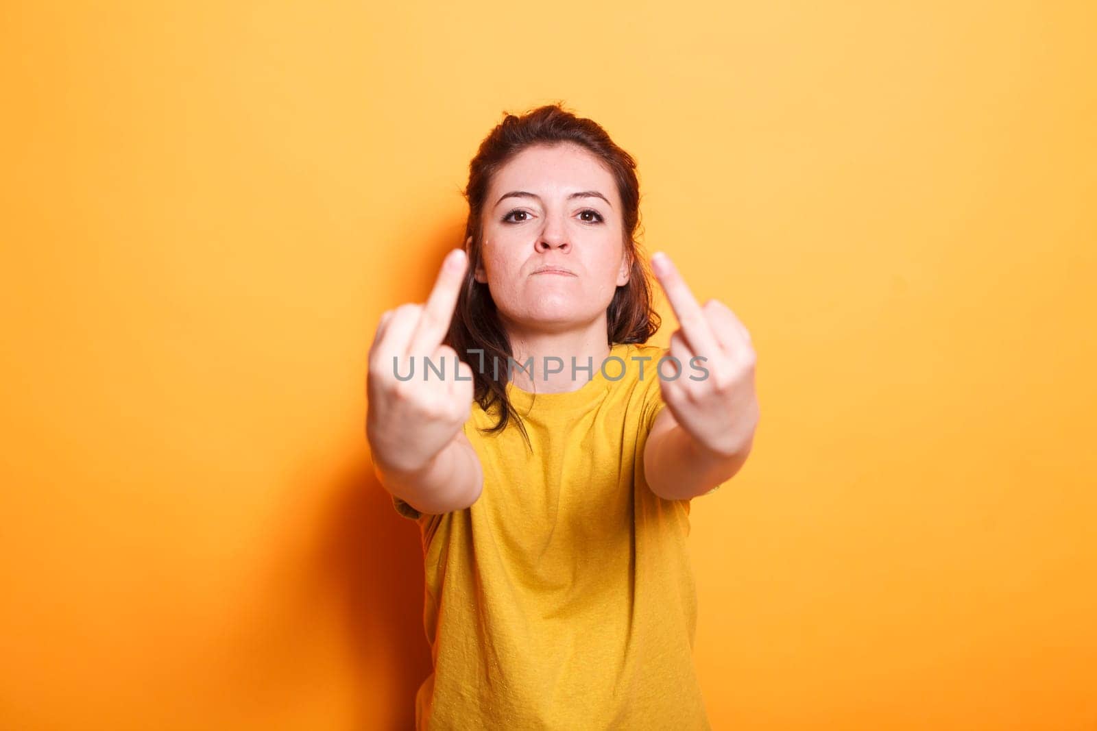 Woman showing aggressive gestures by DCStudio