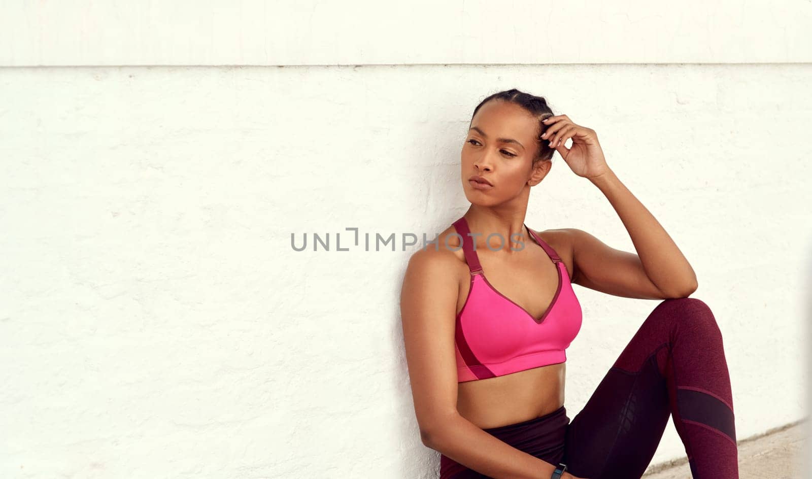 Black woman, thinking and exercise break in sportswear for fitness and healthy in New York. Lifestyle, female person and satisfied with self care or wellbeing in summer and confident with results by YuriArcurs