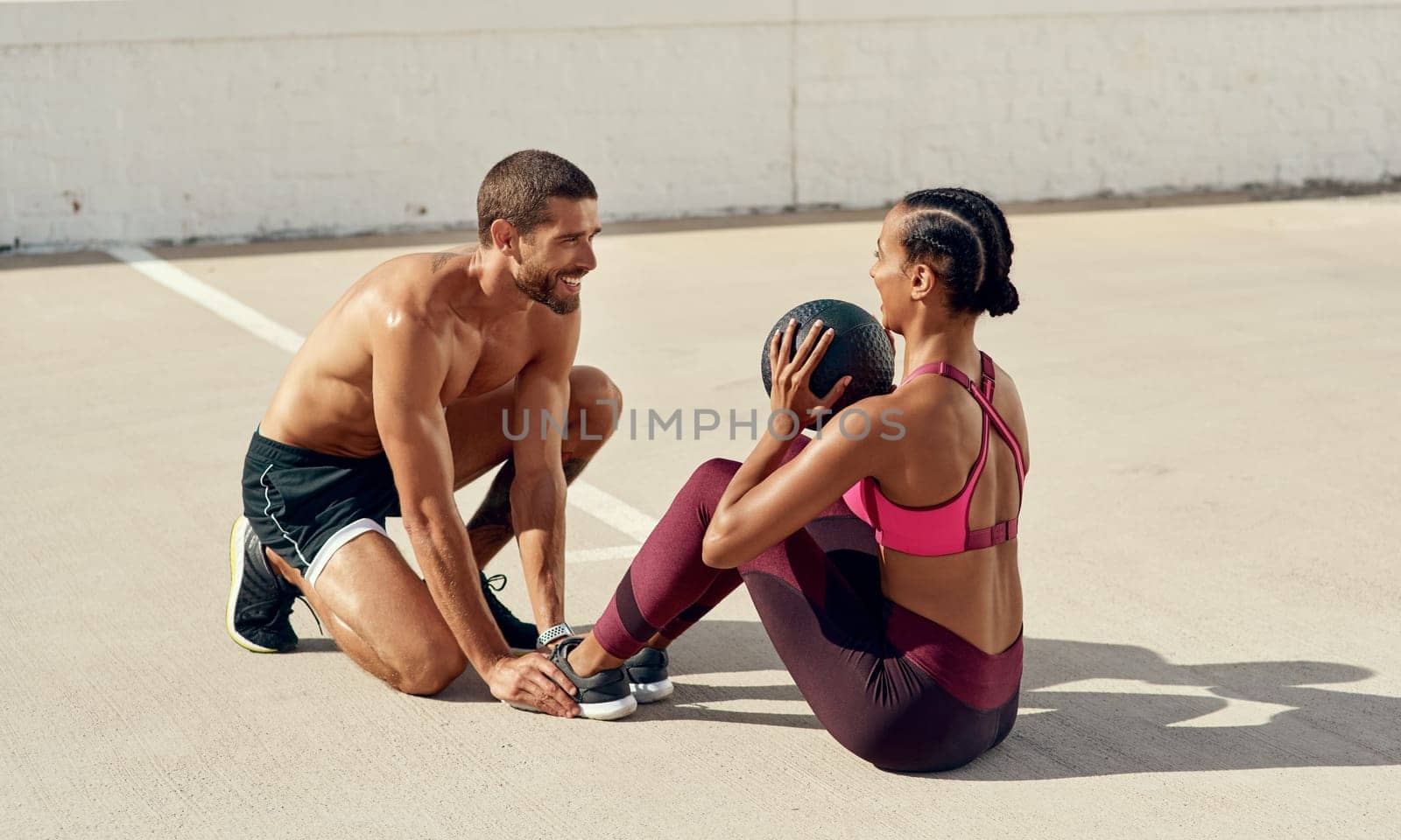 Medicine ball, outdoor and exercise for woman, balance and training in gym, workout and fitness for body. Sports, athlete and personal trainer for strength, wellness and building of muscle for sports.