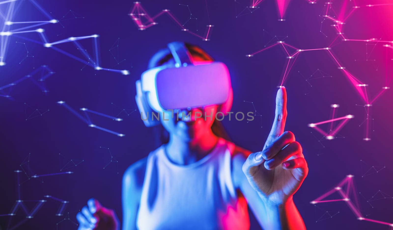 Blurry of female stand in cyberpunk neon light wear white VR headset and tank top connect metaverse, future cyberspace community technology, She use finger touch virtual reality object. Hallucination.