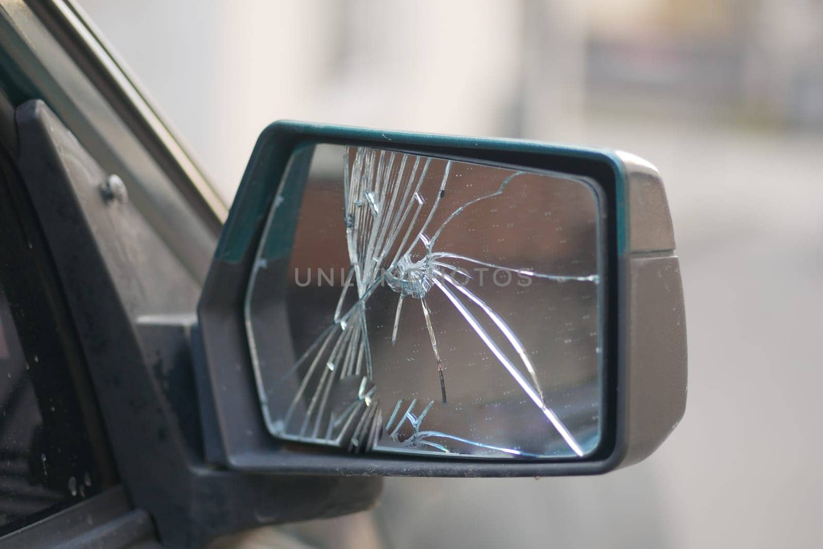 broken car rear view mirror.