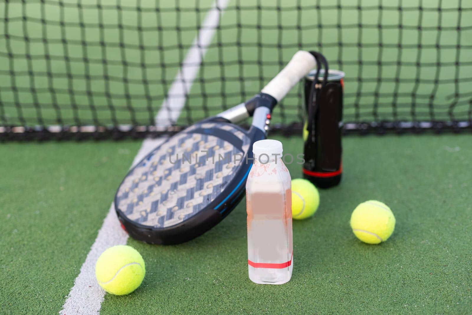 Set of sport equipment on green grass. High quality photo