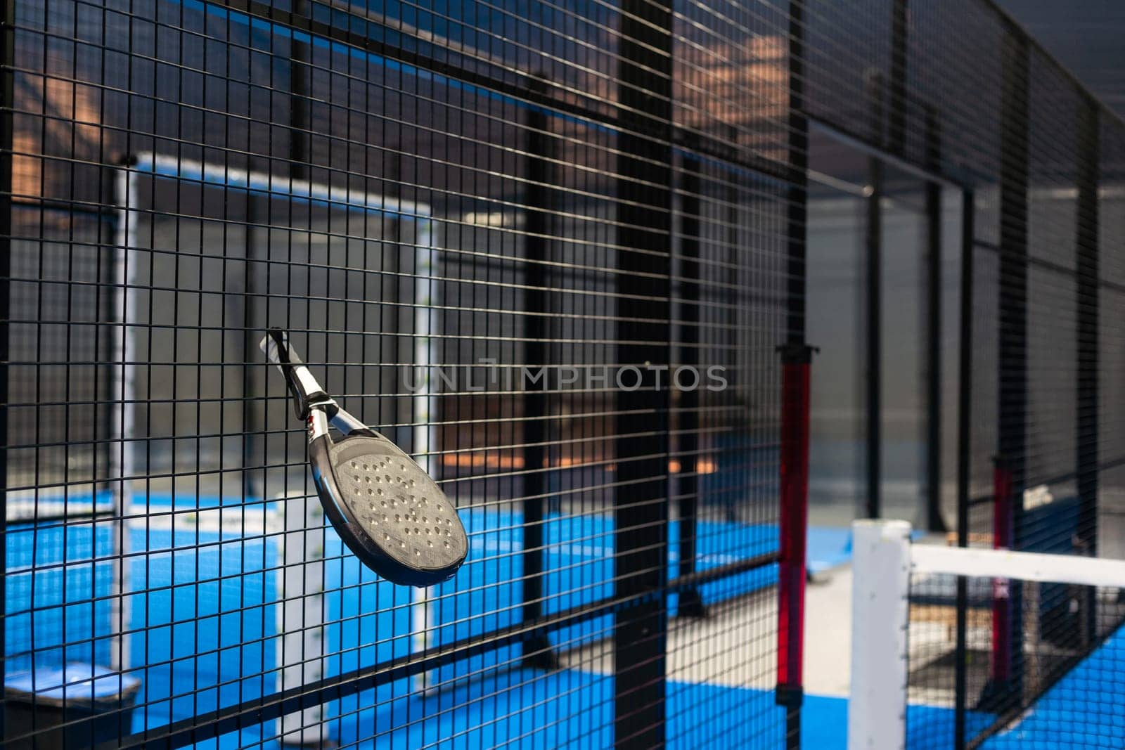 Paddle objects on blue turf. High quality photo