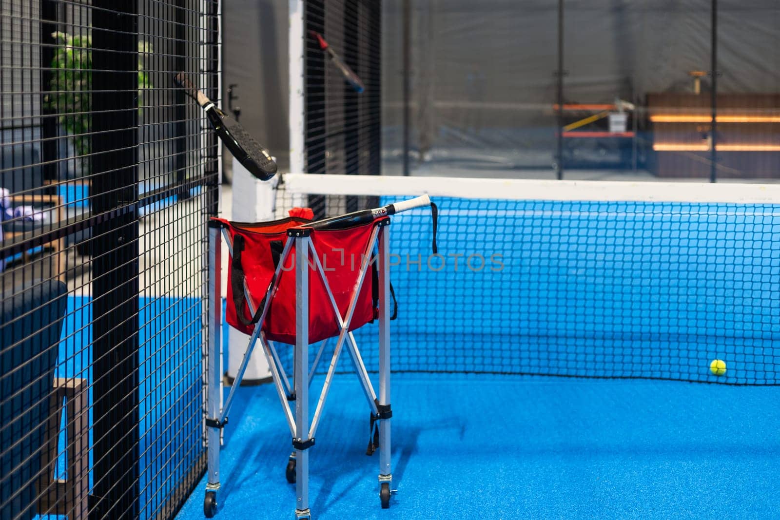 Paddle objects on blue court. High quality photo