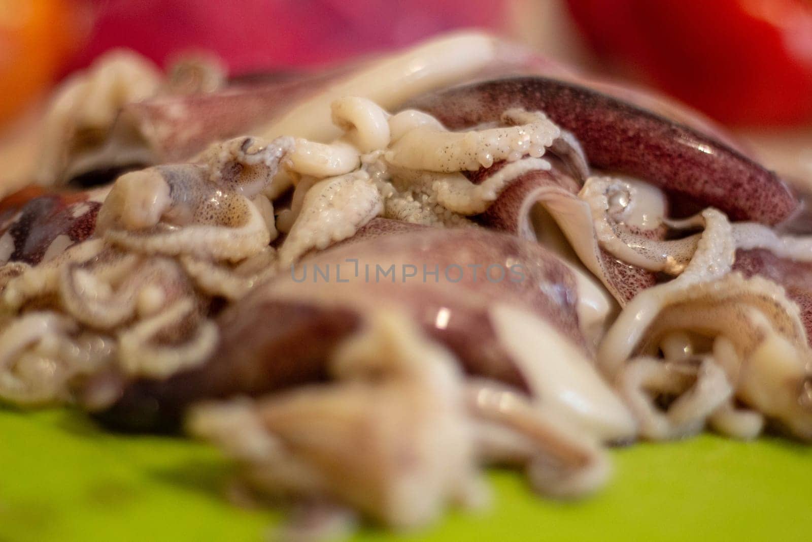 Preparation for Paella: Fresh Calamari Ready for Chopping