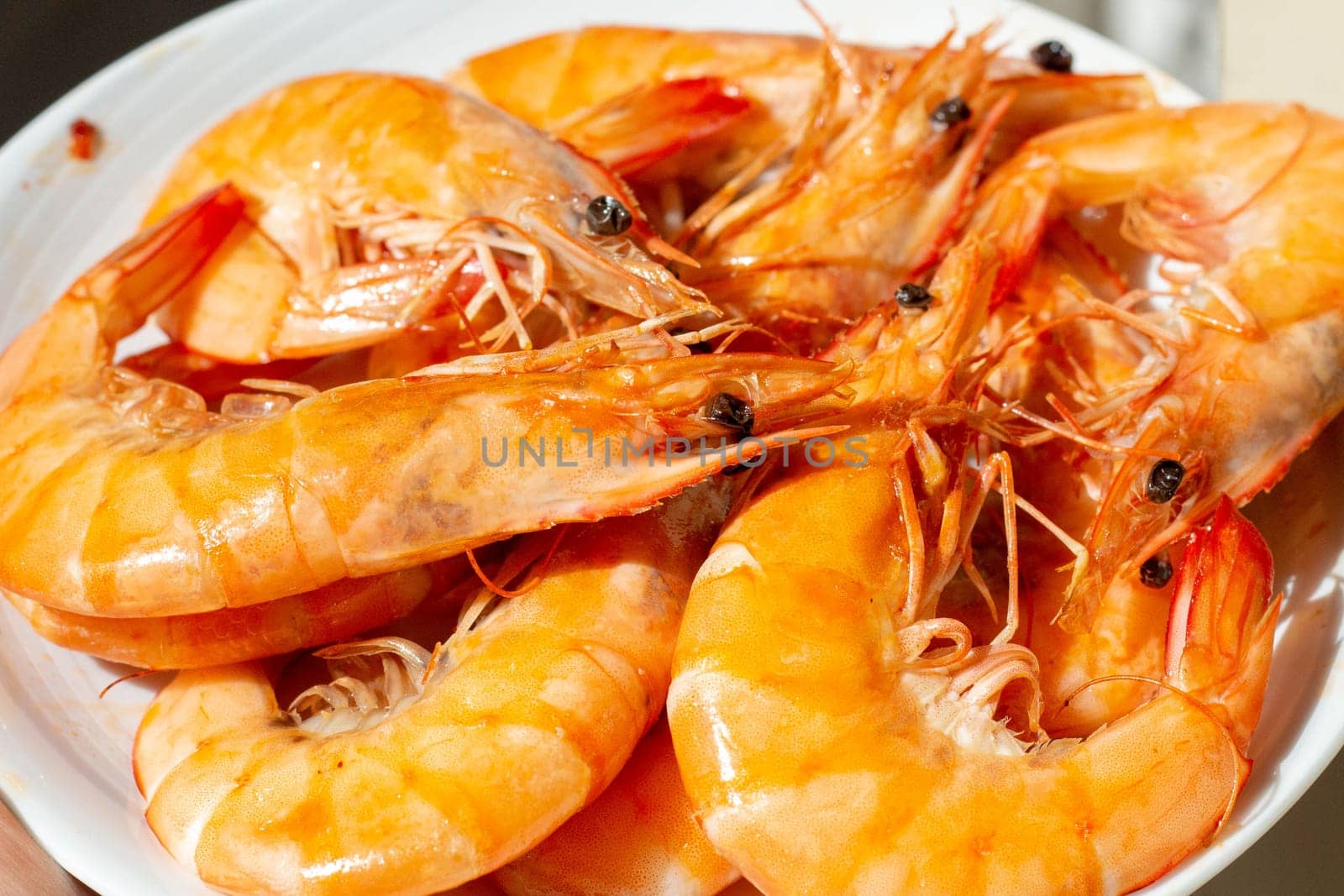 Experience the essence of Spanish cuisine with sizzling shrimp, a flavorful ingredient in the making of authentic paella