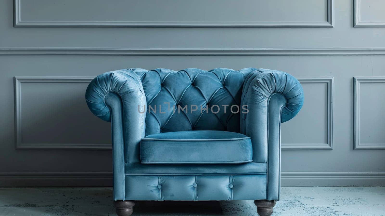 A blue chair sitting in front of a wall with wood trim