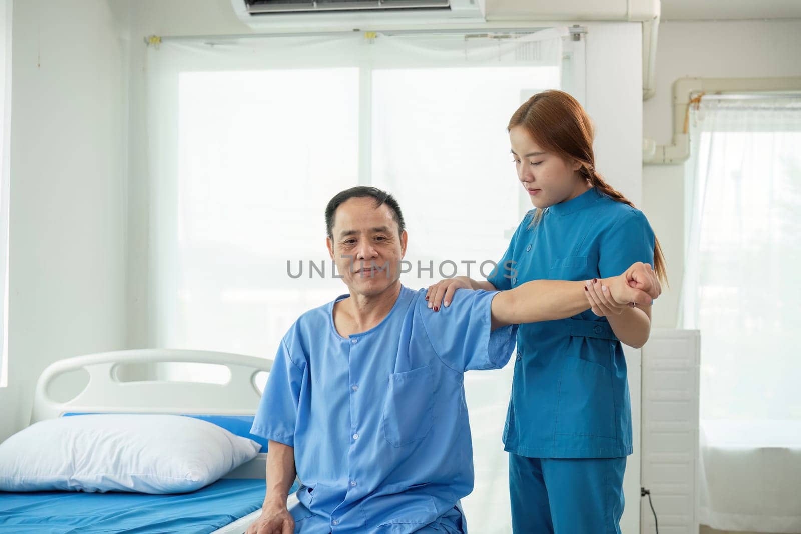 Nurse taking care of patients Help with physical therapy to restore muscles. and help take care of the health of patients by wichayada