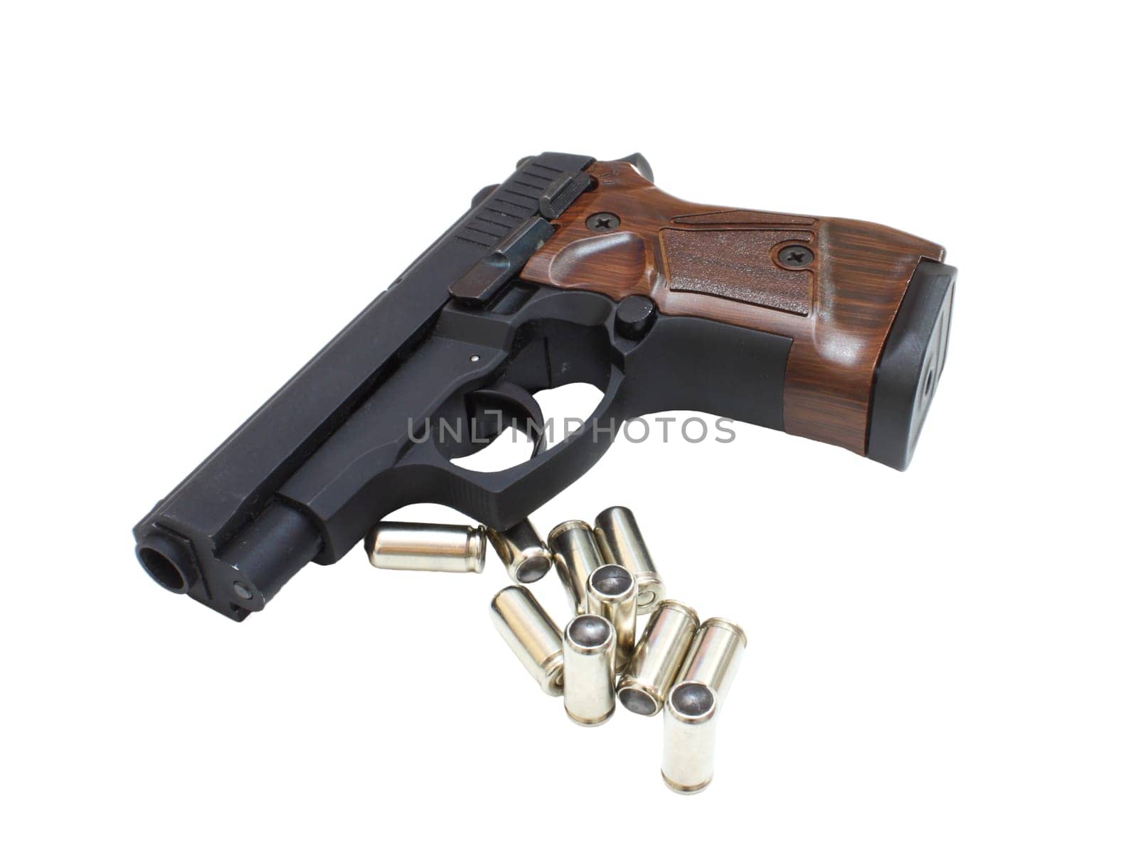 9mm pistol bullets and handgun isolated on white background.