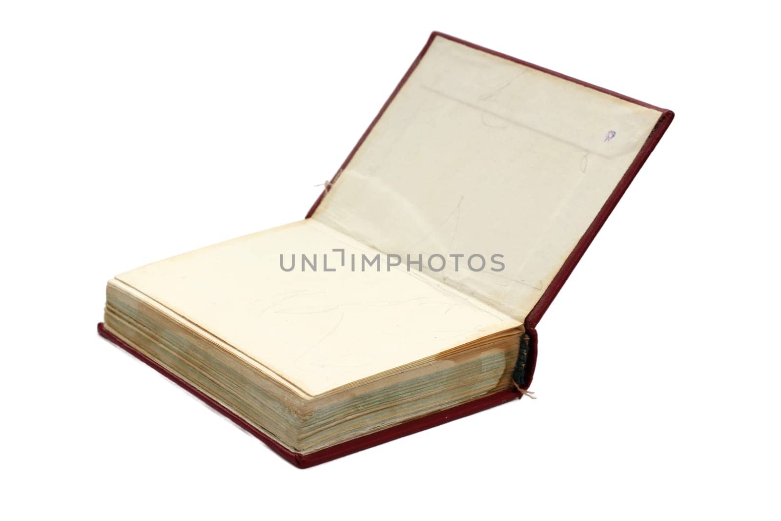 Old red book notepad isolated on white background.