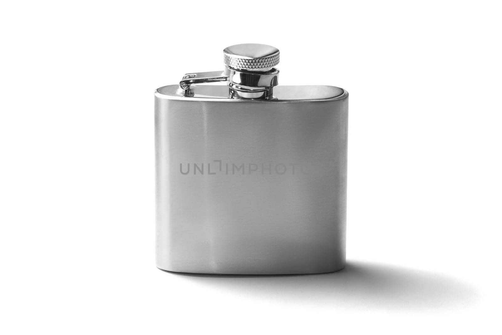 Small metal flask alcohol container isolated on white background. Stainless hip flask close-up macro, mock-up ready