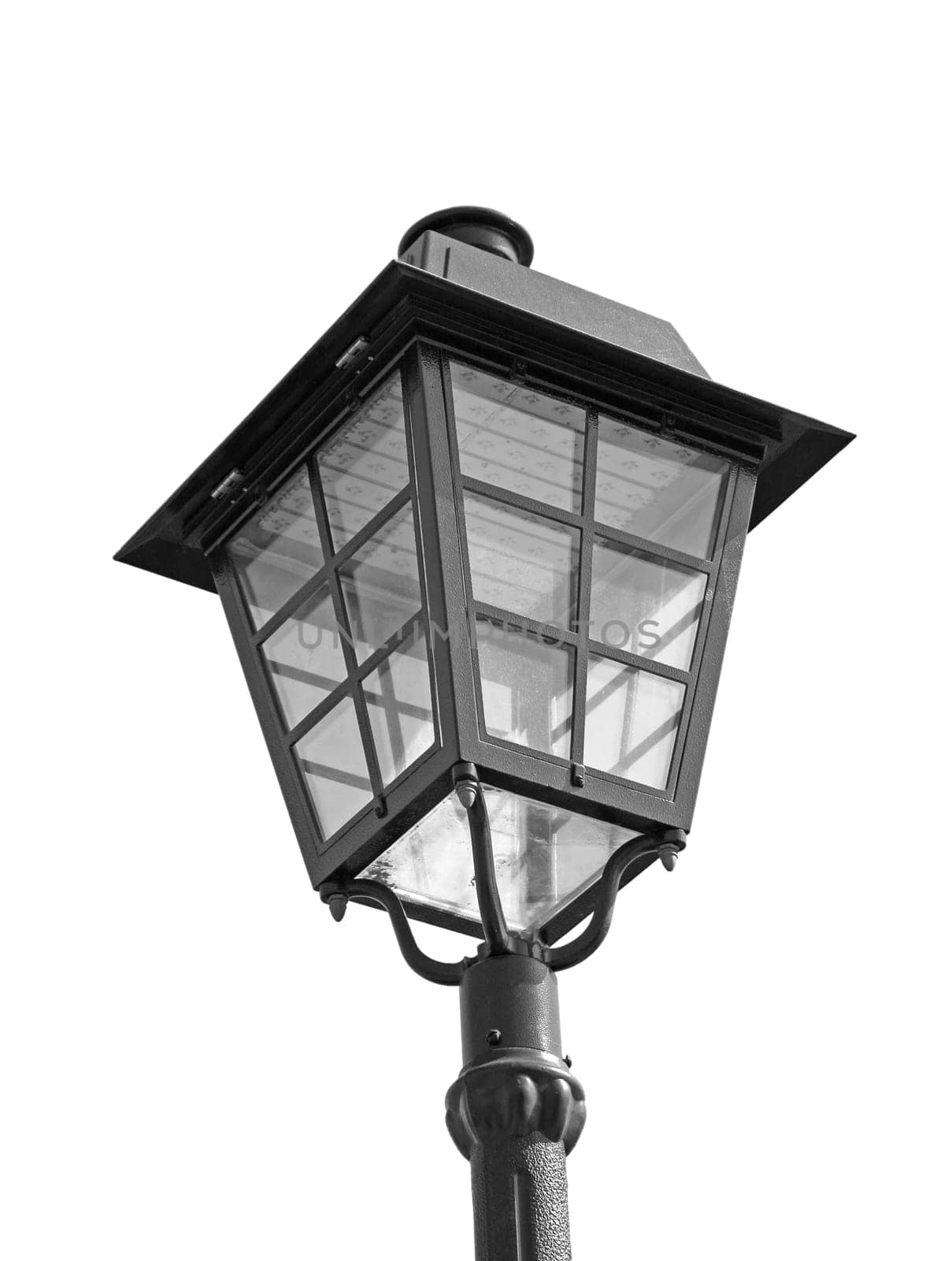 Street light with dual lanterns illuminating the night against a white backdrop.