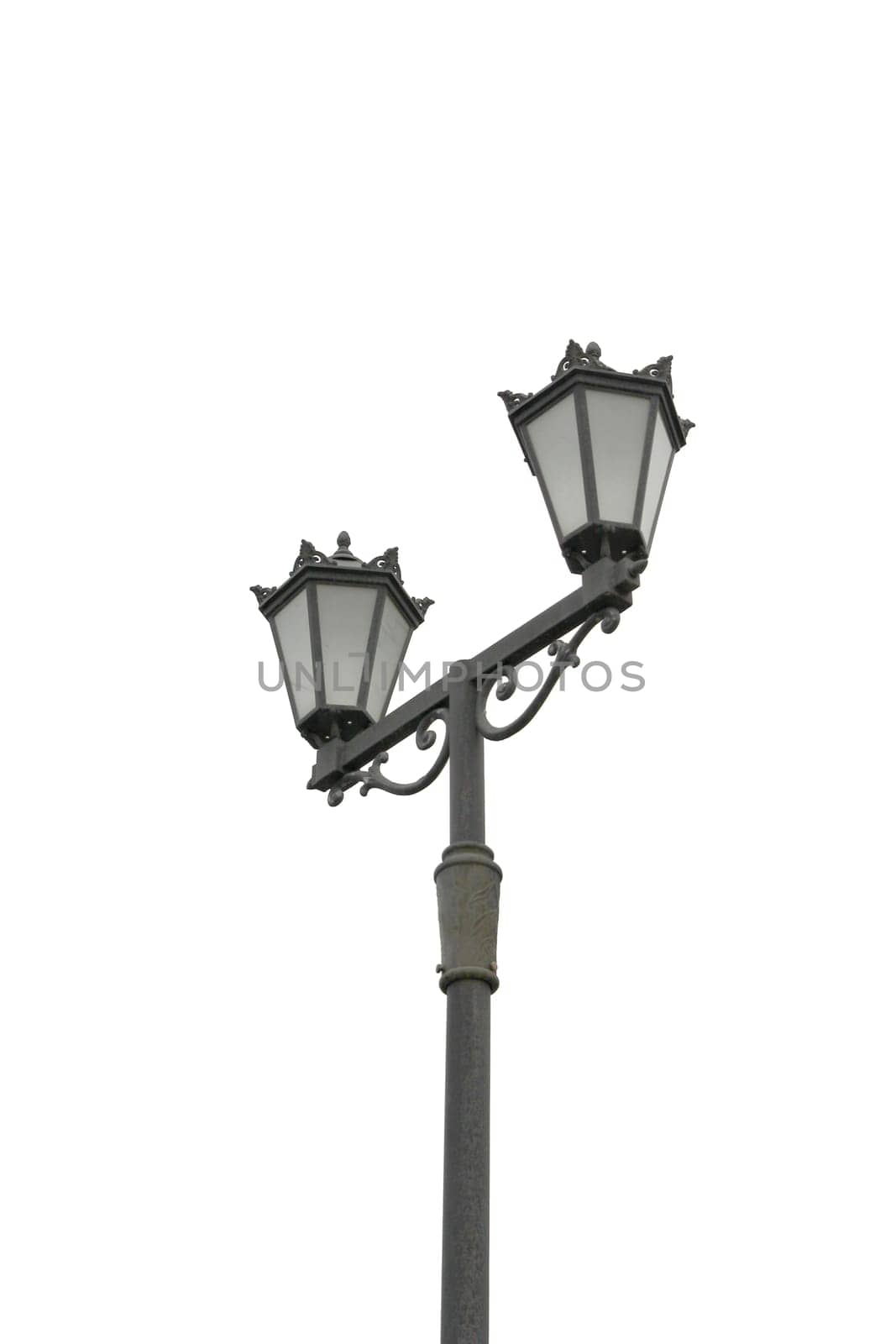 Street light with dual lanterns illuminating the night against a white backdrop.