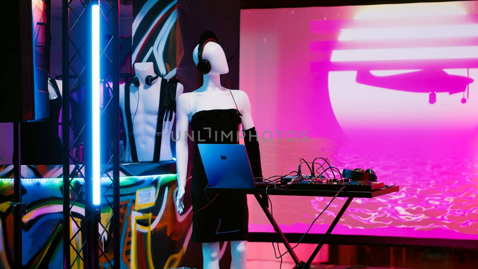 Mixing audio station on stage at club, empty discotheque with dance floor and disco lights. Nightclub with live DJ music and alcoholic drinks, modern funky party with spotlights for fun.