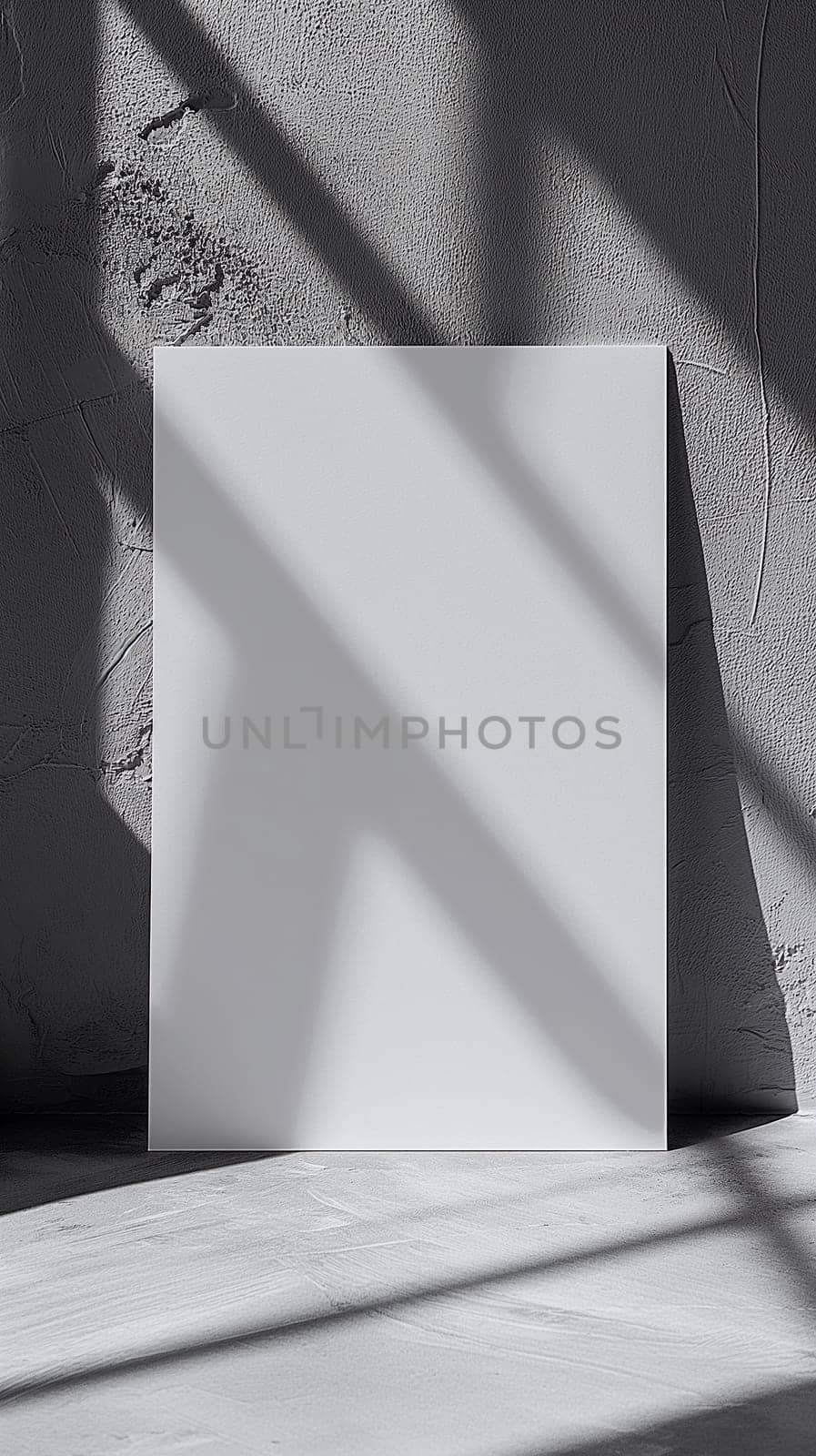 A blank white canvas positioned against a textured wall with contrasting light and shadows creating an artistic composition - marketing and advertising mockup