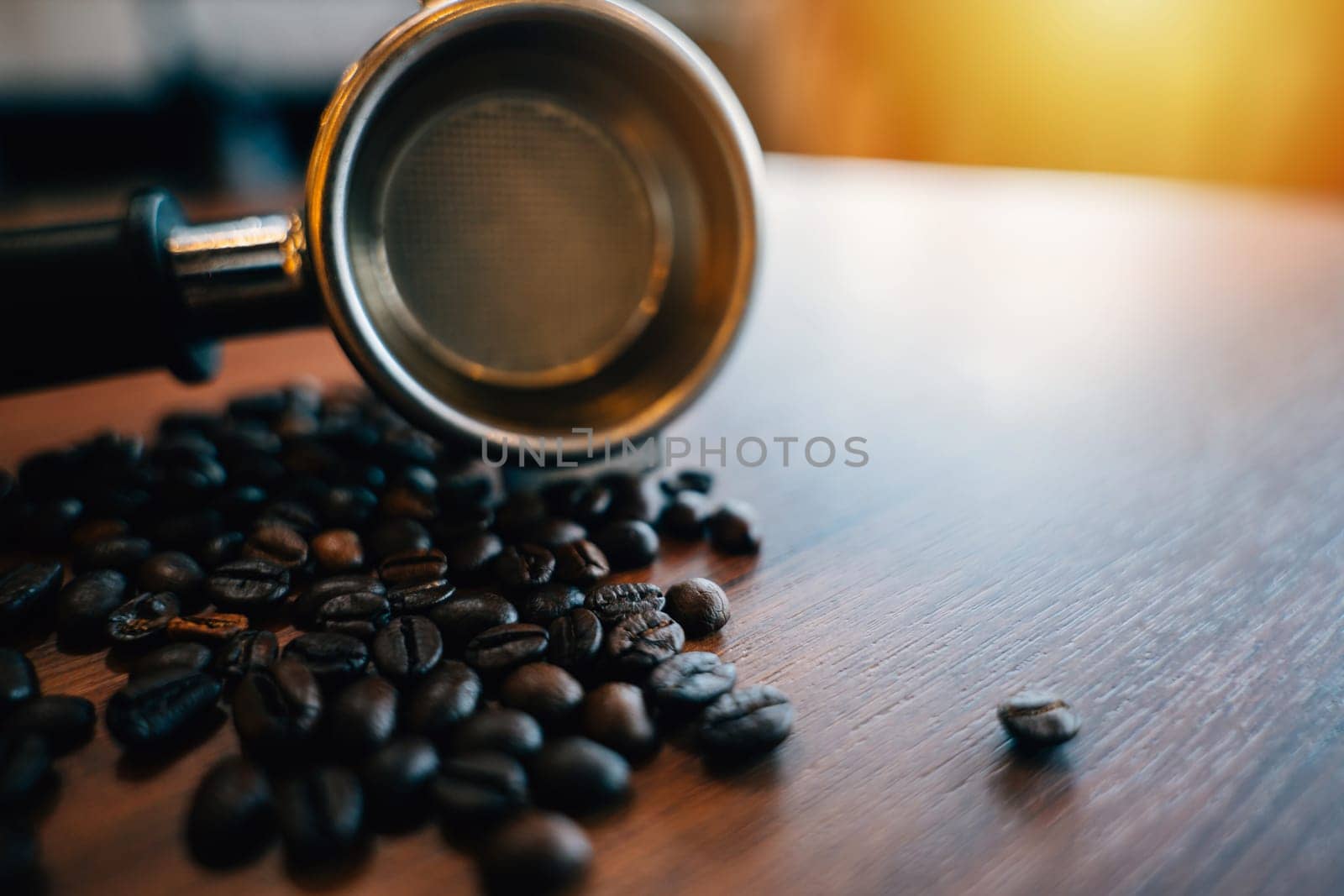 Tamper coffee filter on beans. Metal equipment for gourmet espresso. Modern table in a restaurant organic beans mocha cup. Preparation for rich caffeine drink. by Sorapop