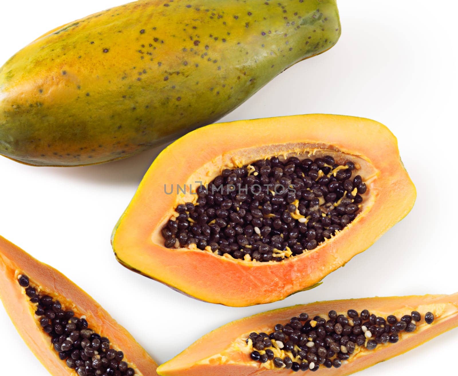 Half, ripe and papaya fruit on isolated studio with white background for natural, healthy, nutrition and wellness of tropical as exotic snack. Vegan, fresh and sweet pawpaw for diet of weight loss.