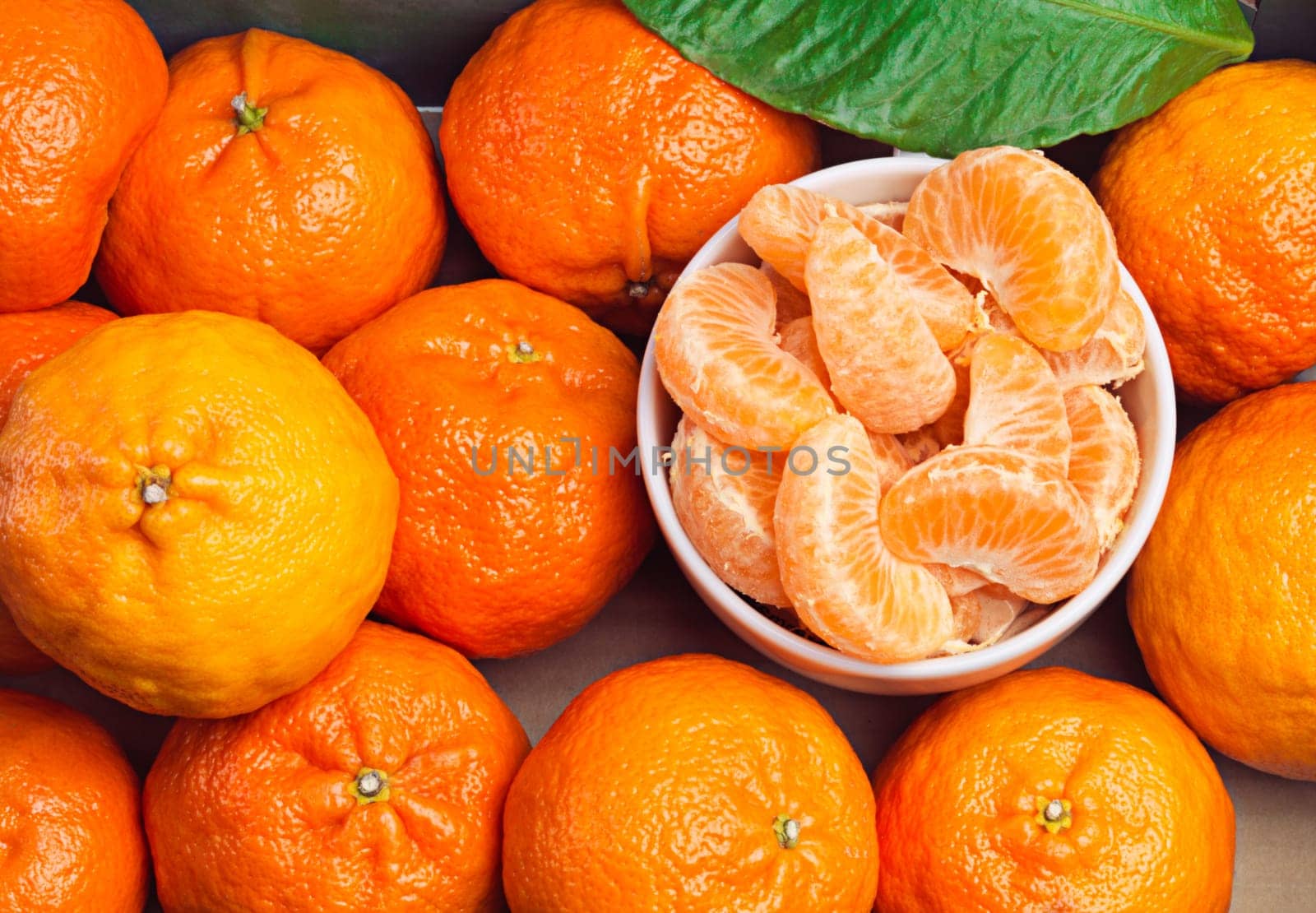 Fruit, healthy and tangerine slice for diet or weight loss in studio, closeup or zoom and orange. Mandarin, food and group or tropical with vitamin c for wellness, eating and nutrition or natural.
