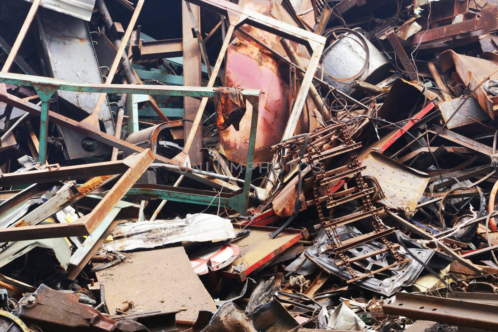 Close-up view of a large metal waste dump. by gelog67