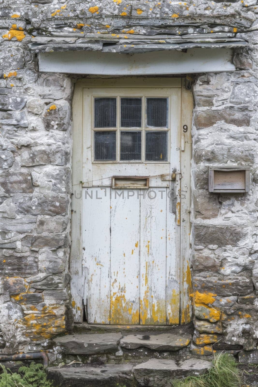 A white door with a yellow and brown paint job