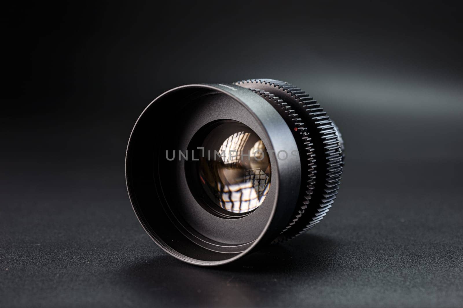 Close-up view of vintage Helios camera lens, black finish, photography gear on dark background, detailed focus rings visible, professional photographic equipment. by mosfet_ua