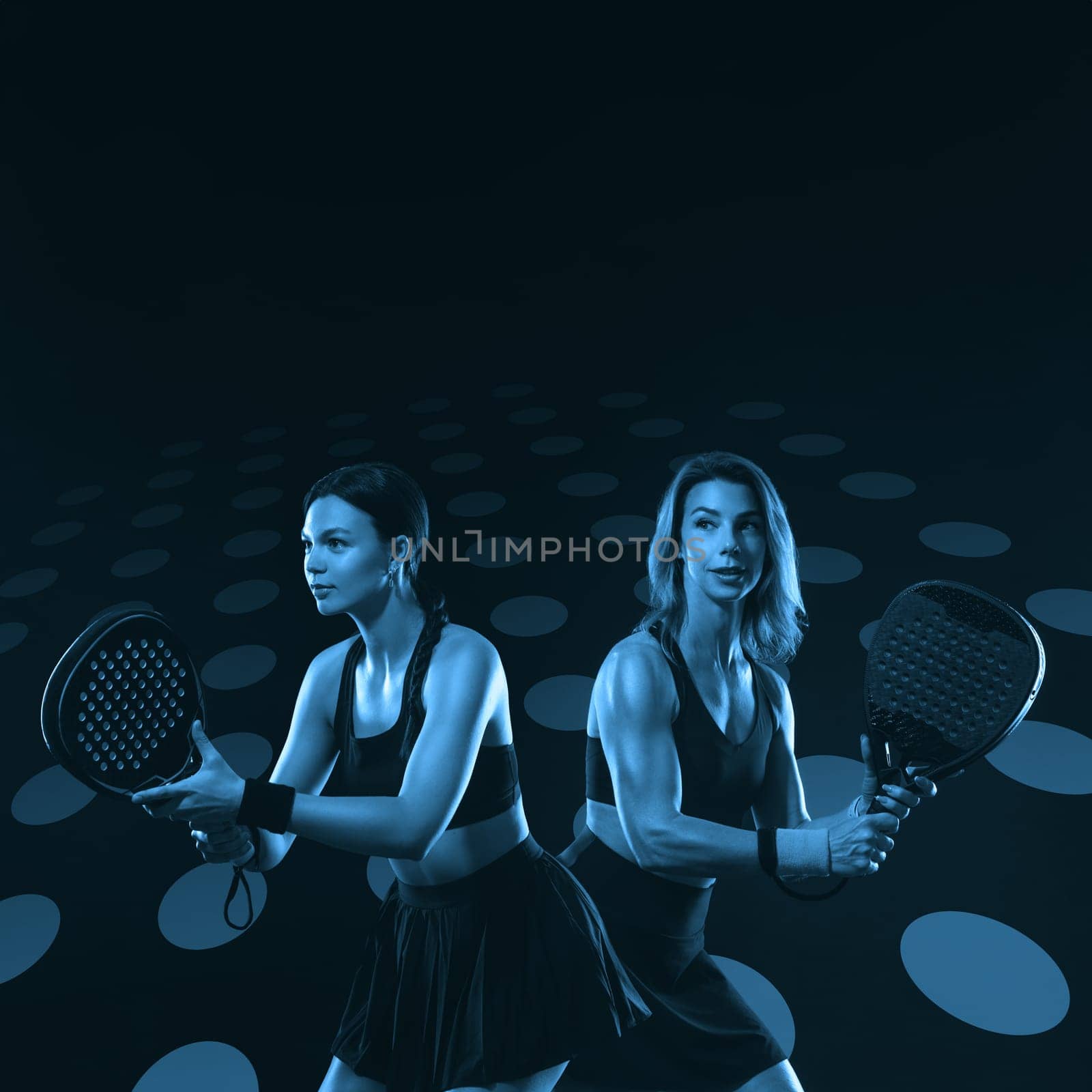 Padel tennis doubles. Two athletes players with racket. Women with paddle racket on court. Sport concept. Download a high quality photo for the design of a sports app by MikeOrlov