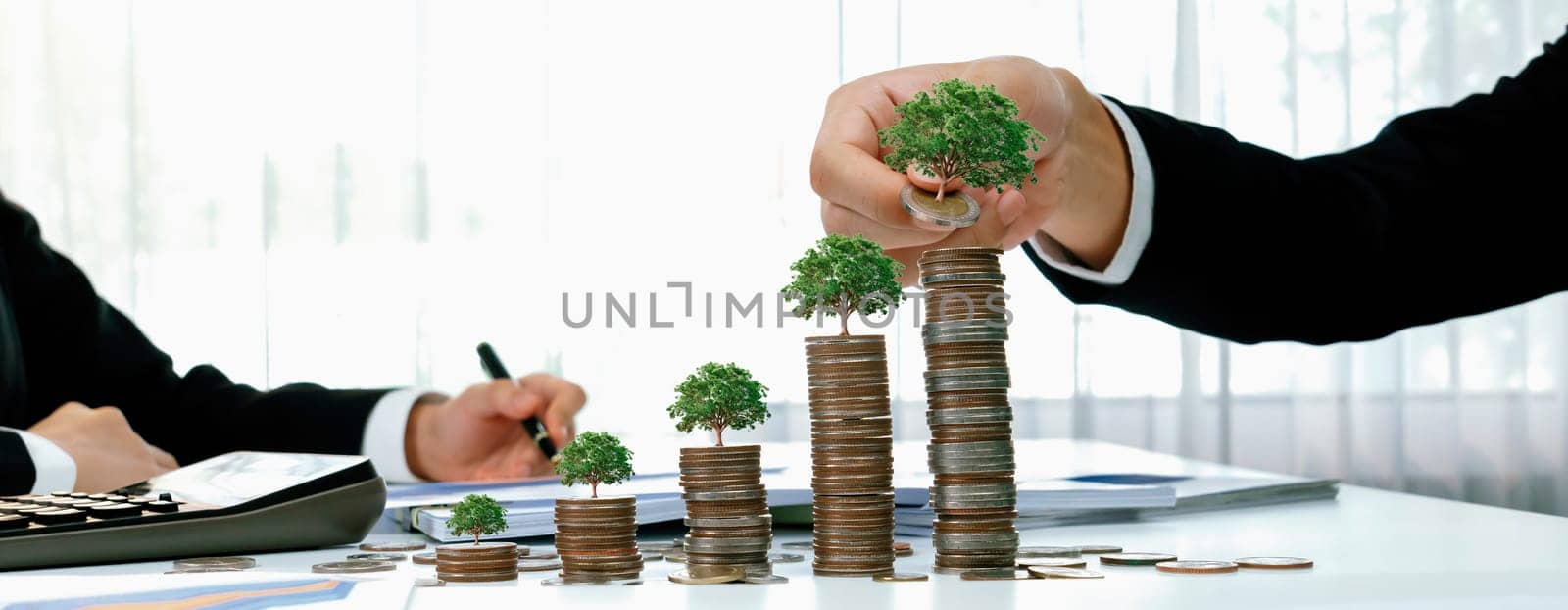 Growth coin stack with tree on top symbolize green business investment. Shrewd by biancoblue