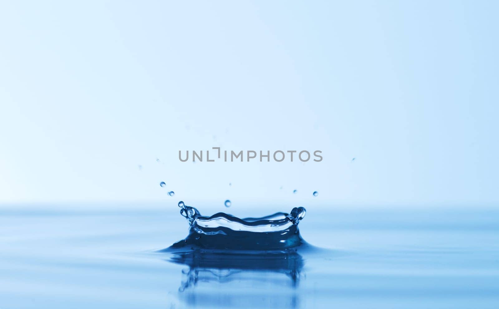 Abstract, splash and puddle of water with hygiene, product and clean with mockup space and promotion. Liquid, h20 and sustainability with drops, spring and hydration with detail, empty and natural by YuriArcurs