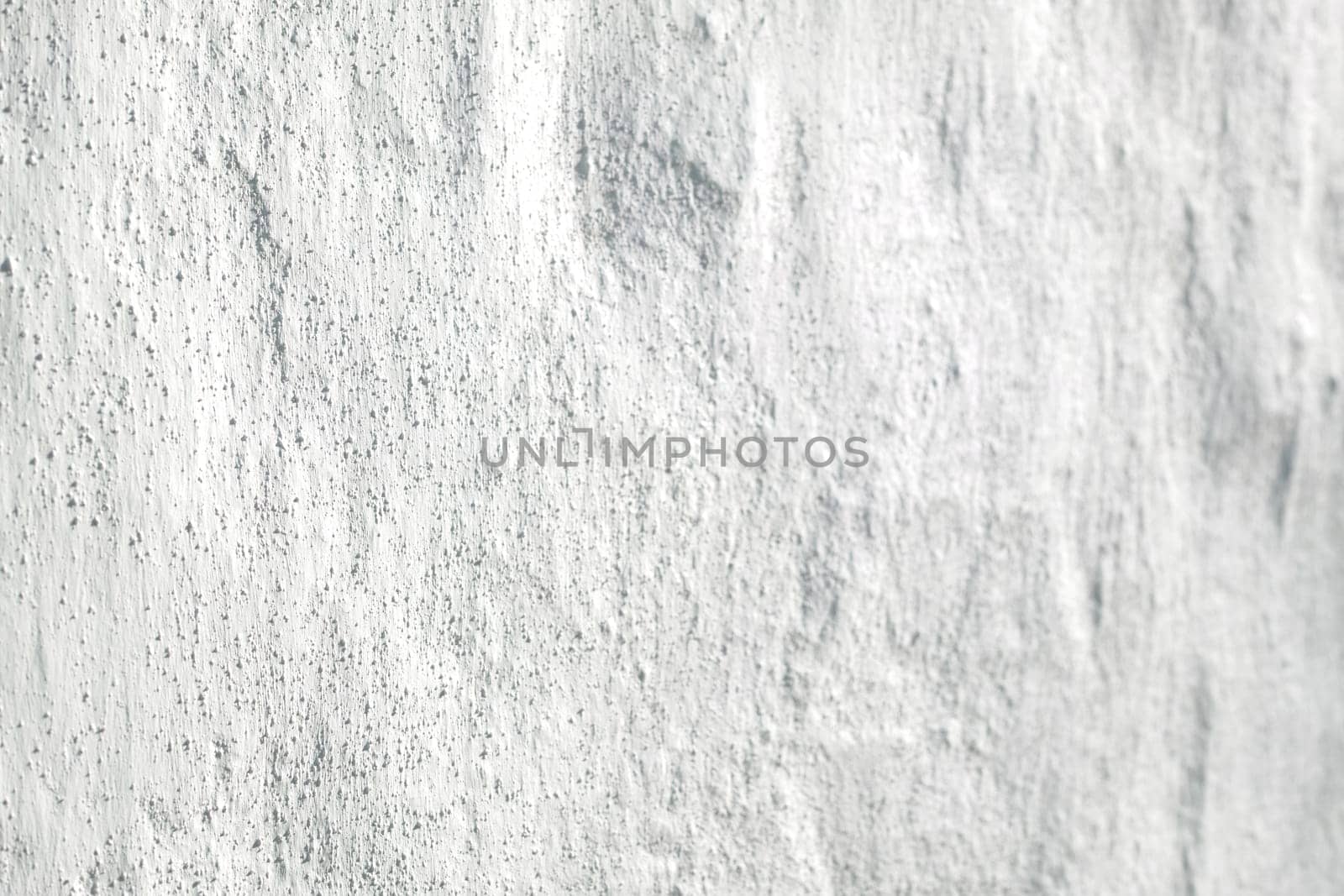 Wall, background and white texture with cement, architecture and building for mockup space. Wallpaper, decoration and crack with antique, retro and vintage construction for rough or rustic detail.