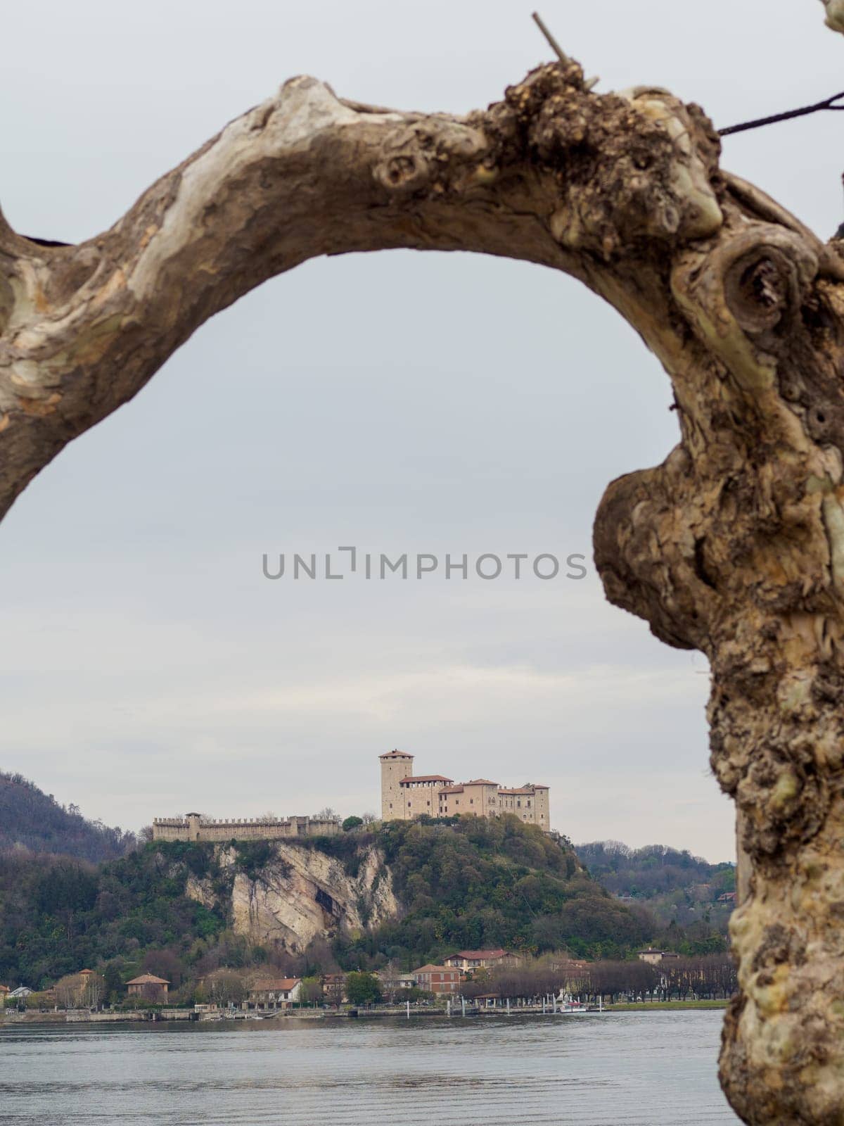 View of the Medieval Rocca Borromea di Angera from Arona, Lake Maggiore, Italy by verbano