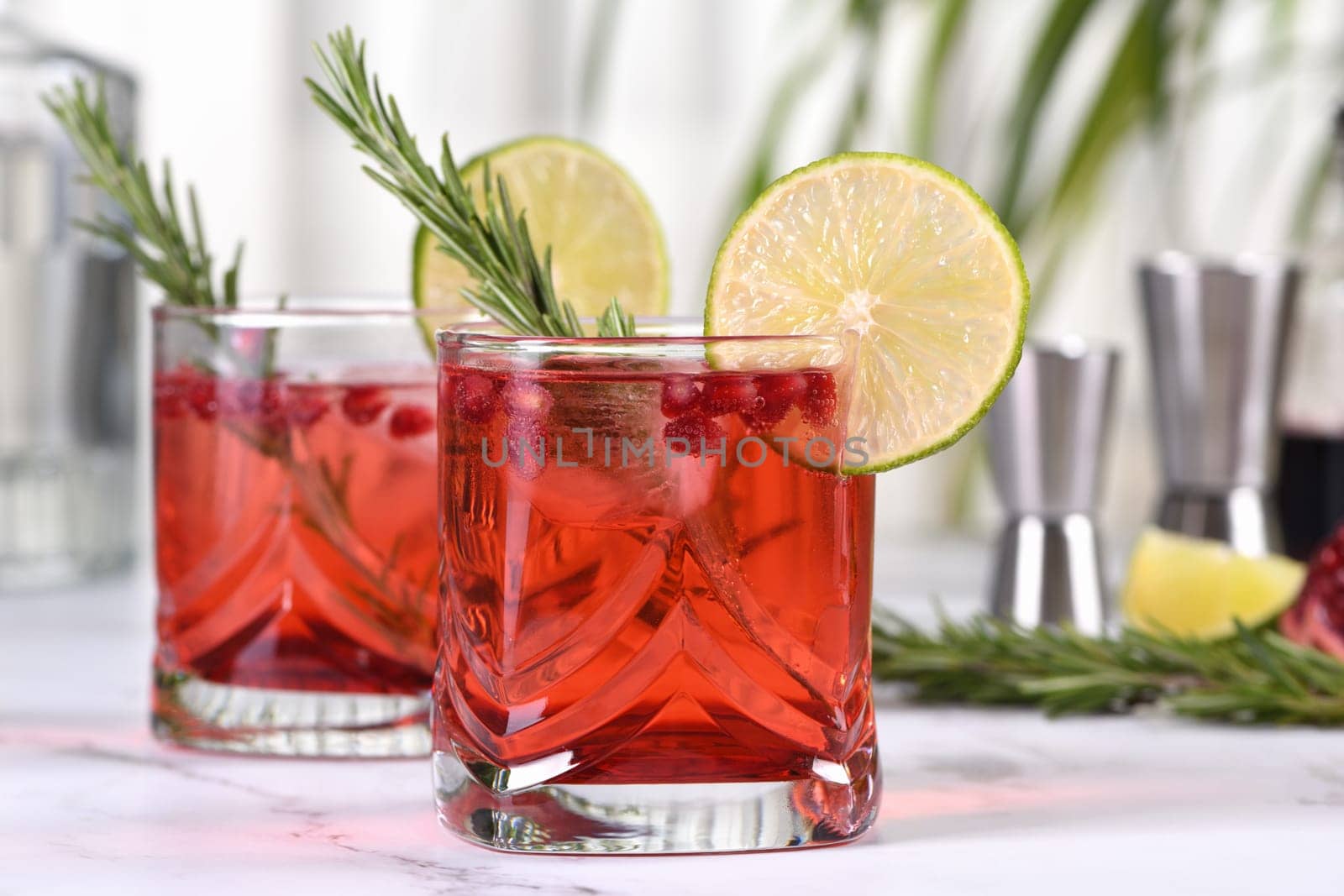 Sweet, tart pomegranate gin and tonic. This simple cocktail of gin or tequila, tonic and grenadine together in just a few minutes. Ideal for holiday celebrations. 