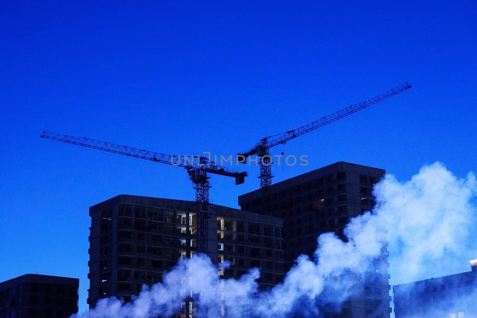 Smoke Engulfs Urban Skyline, construction cranes at night, construction site by darksoul72