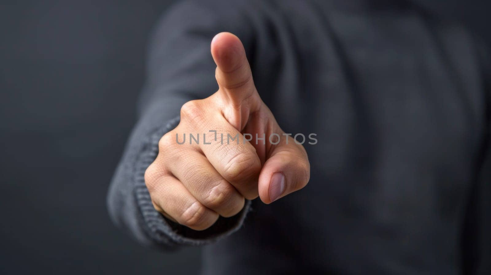 A man pointing at something with his finger