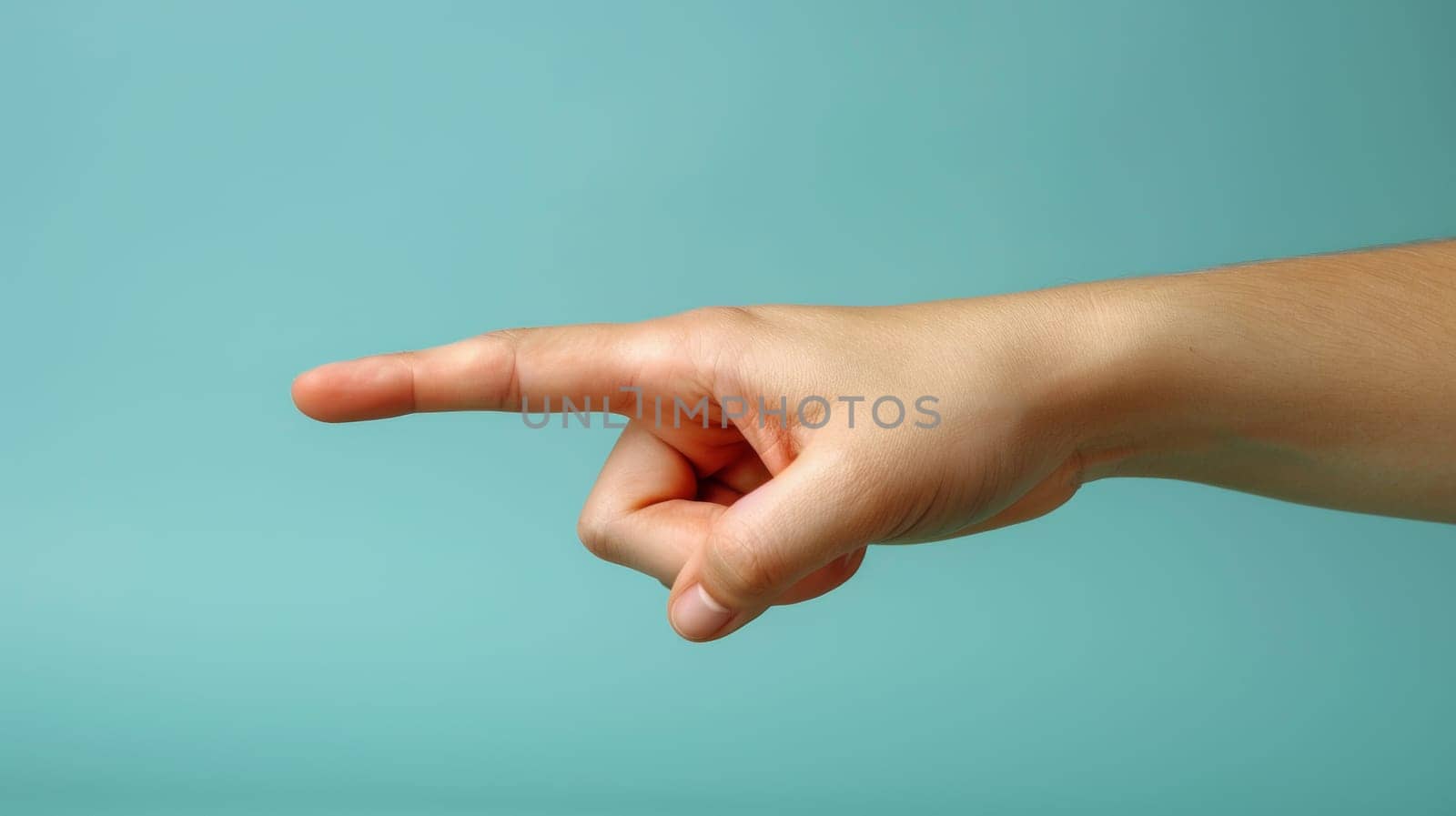 A hand pointing at something with a blue background