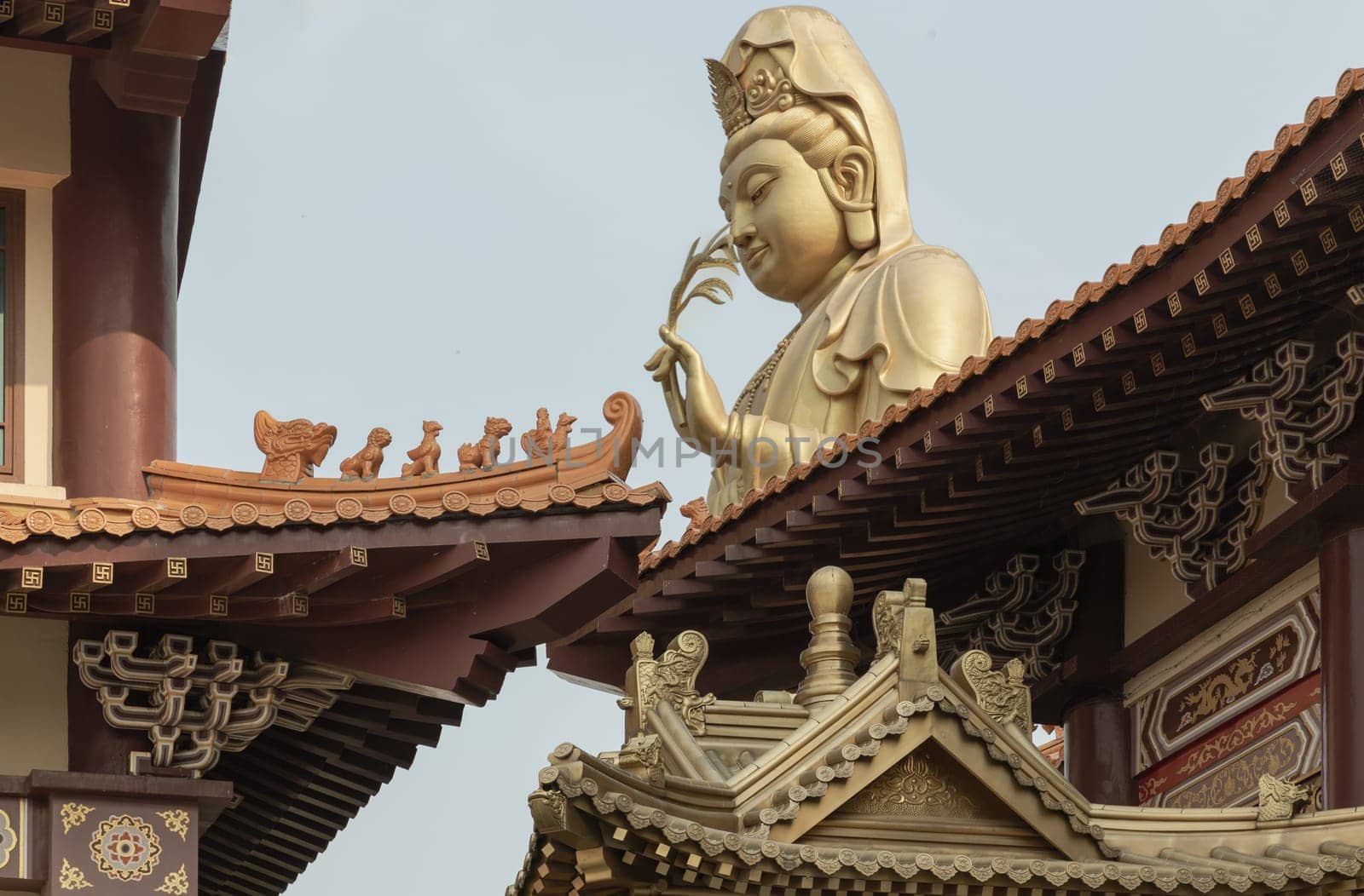 Bangkok, Thailand - Apr 11, 2024 - Big Golden statue goddess of Mercy Guanyin or Quan Yin statue at Fo Guang Shan Thaihua Temple. Guan Yin Buddha, Taiwanese temple style, Copy space, Selective focus.