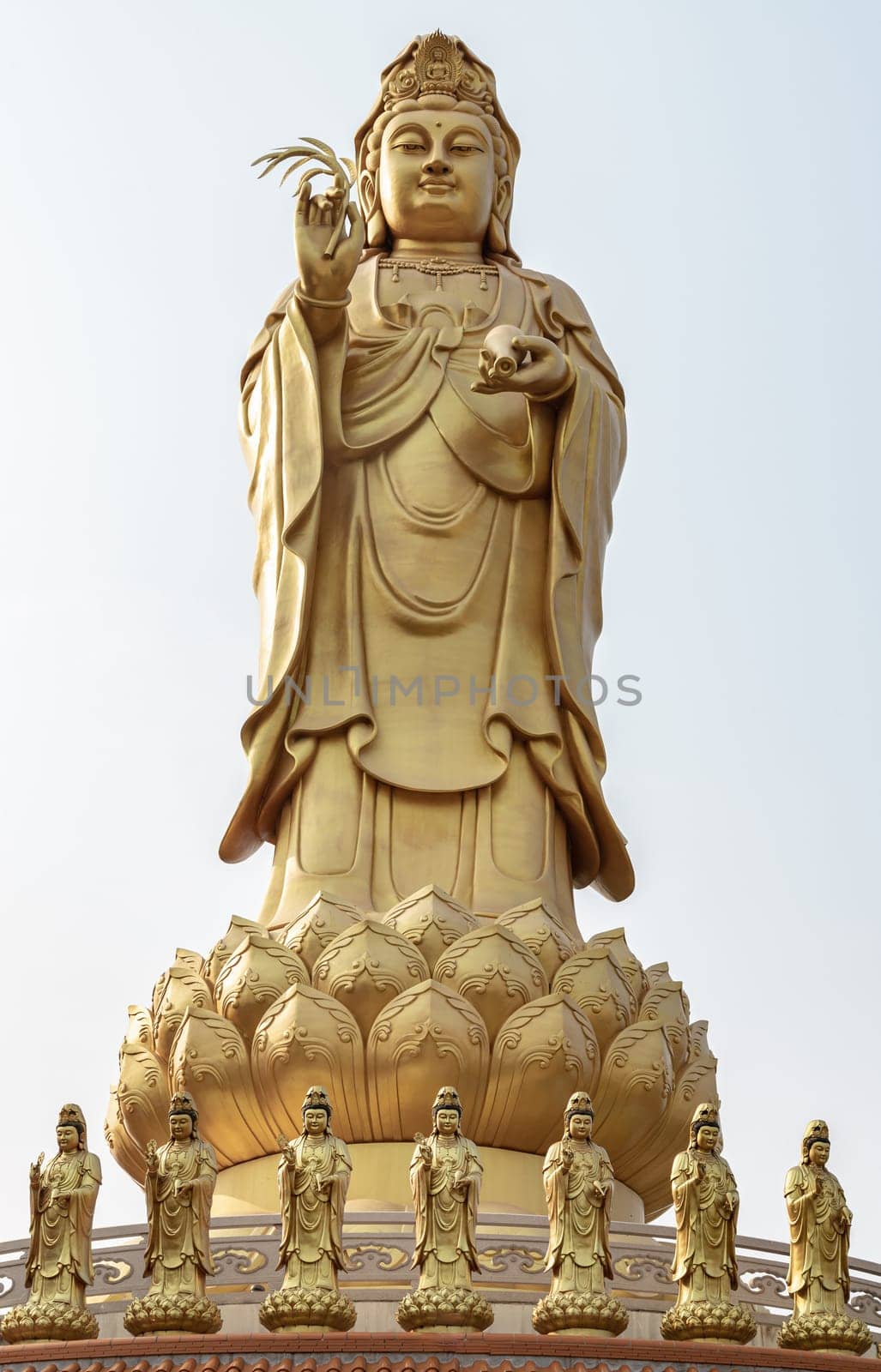 Bangkok, Thailand - Apr 11, 2024 - Big Golden statue goddess of Mercy Guanyin or Quan Yin statue at Fo Guang Shan Thaihua Temple. Guan Yin Buddha, Taiwanese temple style, Copy space, Selective focus.