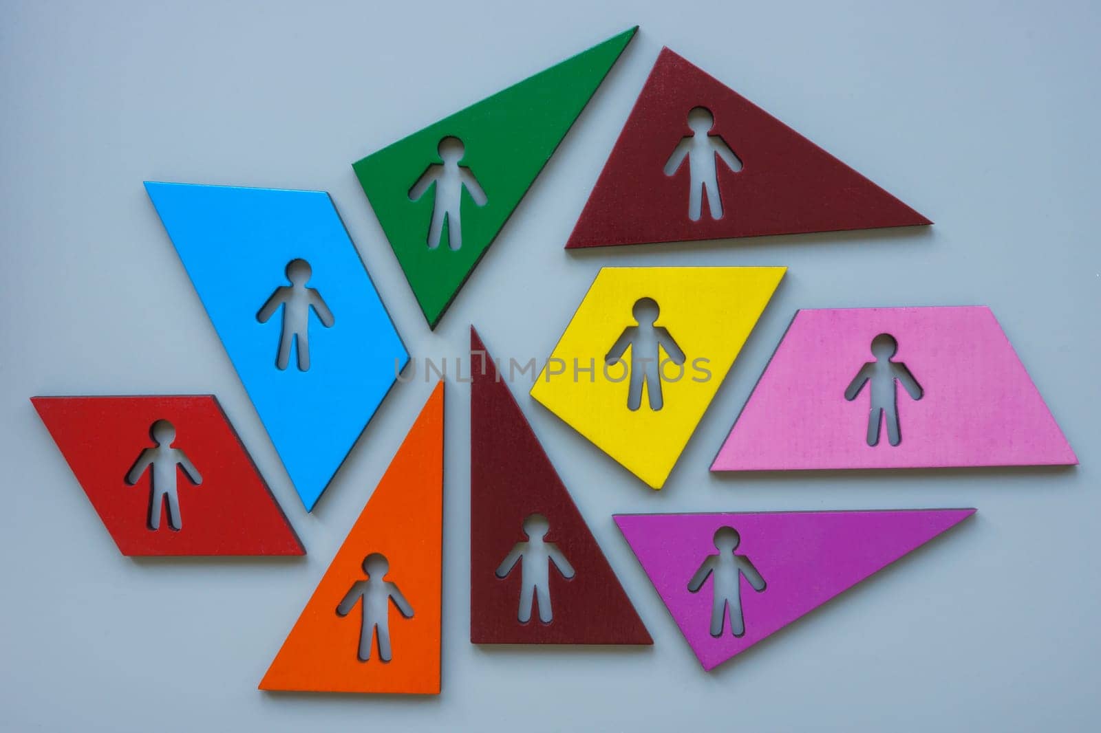 Diversity and inclusion abstract. Multicolored figures with outlines of people.