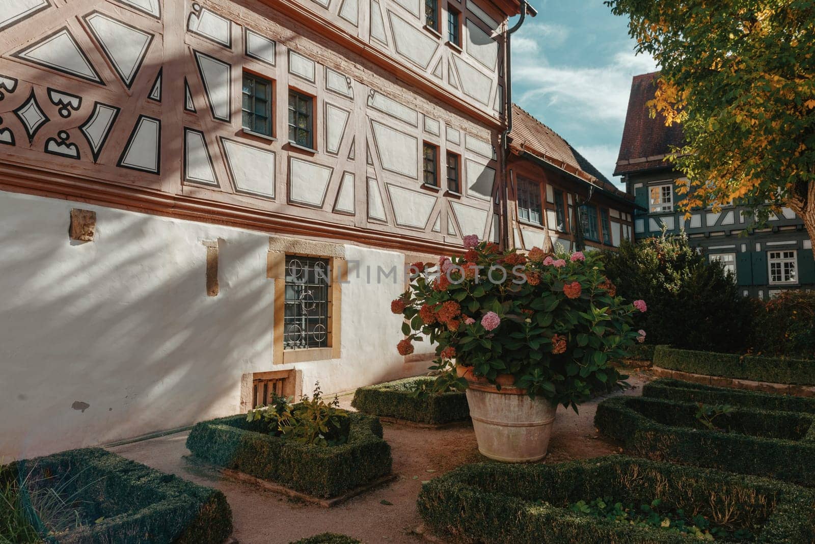 Beautiful Garden and Old National German Half-Timbered houses Town House in Bietigheim-Bissingen, Baden-Wuerttemberg, Germany, Europe. Old Town is full of colorful and well preserved buildings. by Andrii_Ko