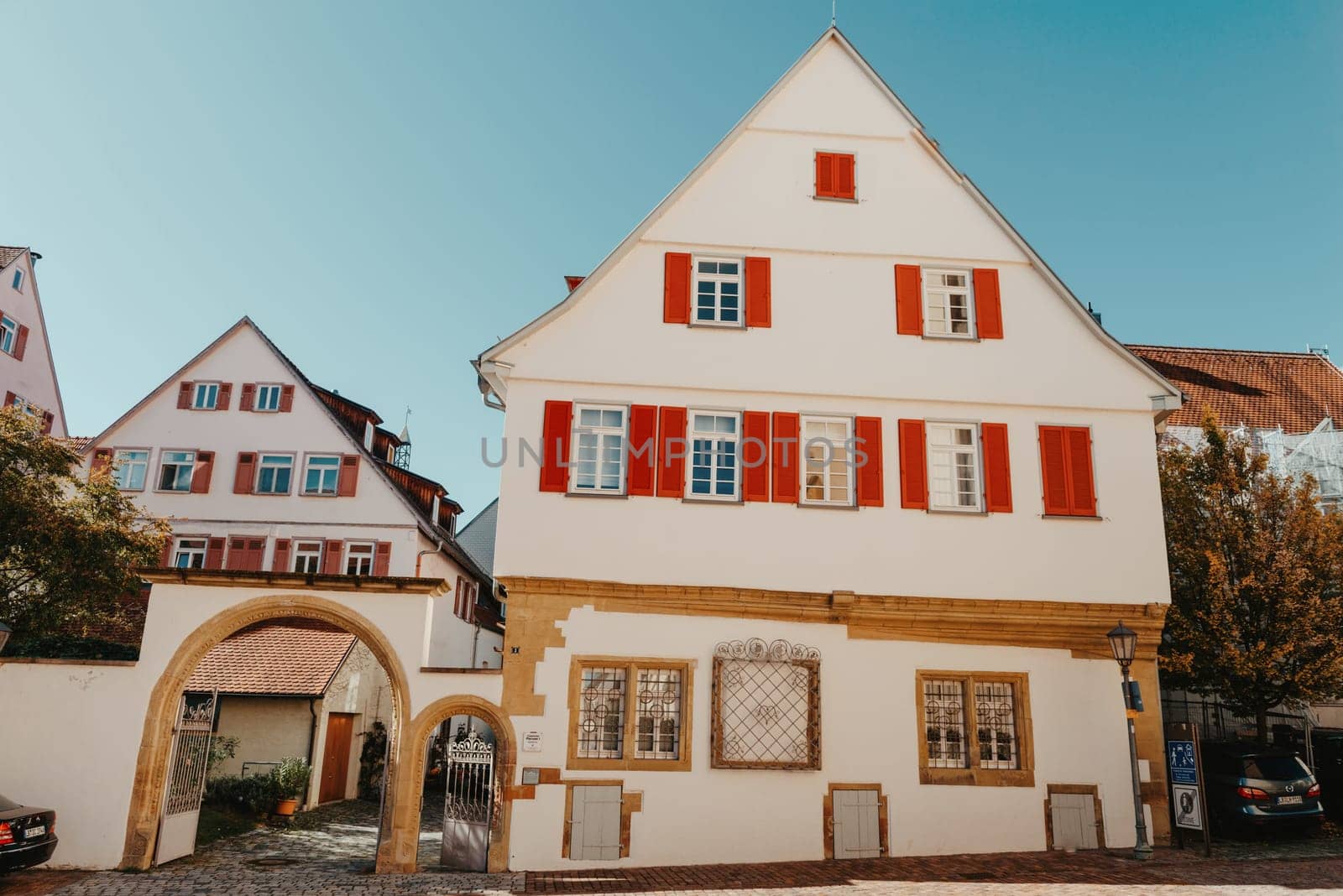 Old national German town house. Old Town is full of colorful and well preserved buildings. Baden-Wurttemberg is a state in southwest Germany bordering France and Switzerland. The Black Forest, known for its evergreen scenery and traditional villages, lies in the mountainous southwest. Stuttgart, the capital, is home to Wilhelma, a royal estate turned zoo and gardens. Porsche and Mercedes-Benz have headquarters and museums there. The 19th-century Hohenzollern Castle sits in the Swabian Alps to the south.